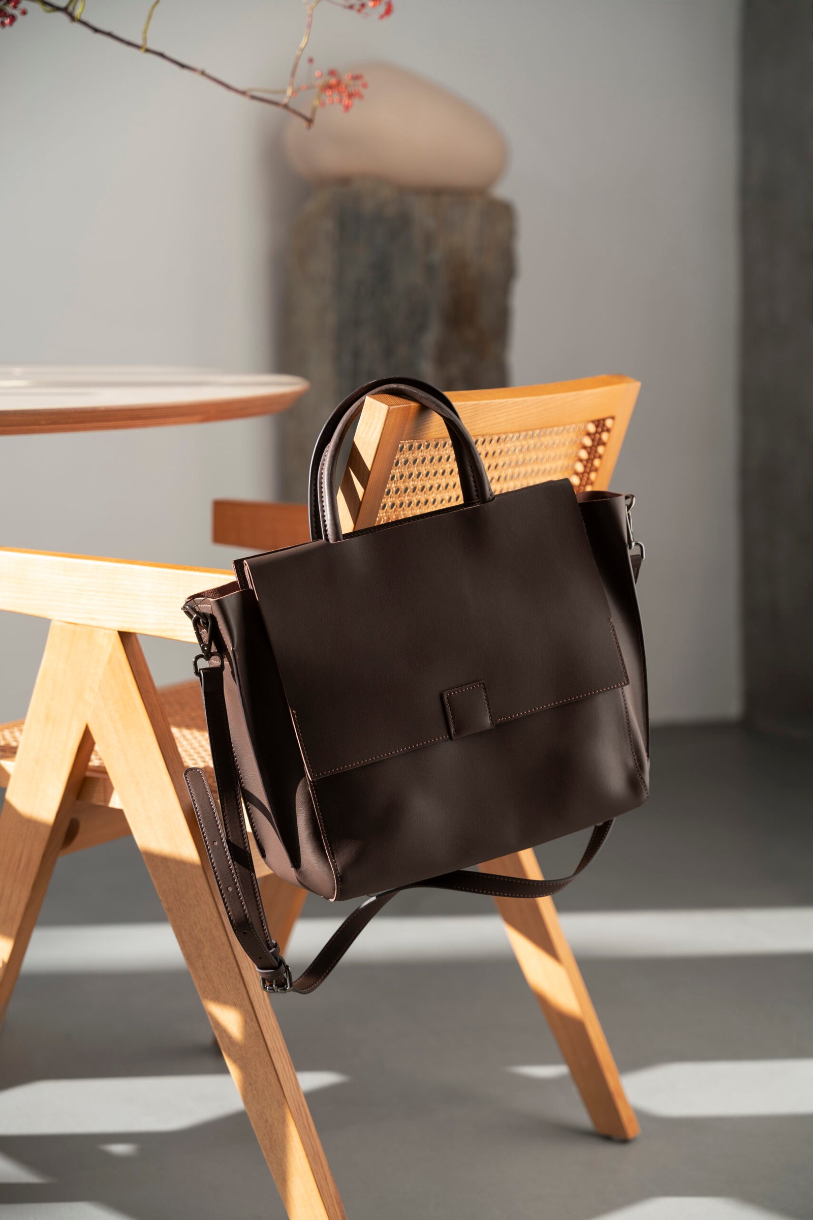 bag-hanging-from-furniture-item-indoors